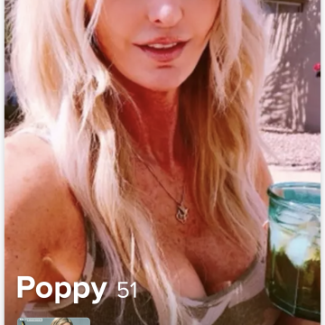 A woman with long blonde hair holding a green glass jar outdoors; interface overlay shows name 'Poppy', age '51', and music track info.