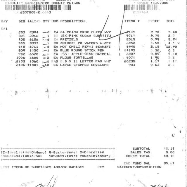 A printed receipt from Keefe Commissary Network Sales dated July 11, 2016, listing items purchased for Centre County Prison.