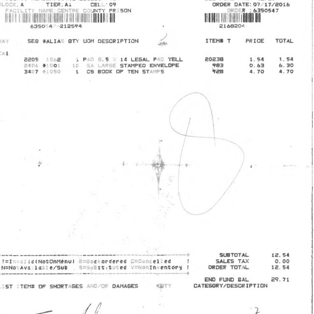 A printed order receipt from Keefe Commissary Network Sales showing items purchased for Centre County Prison, including legal pads and envelopes, with a handwritten signature.