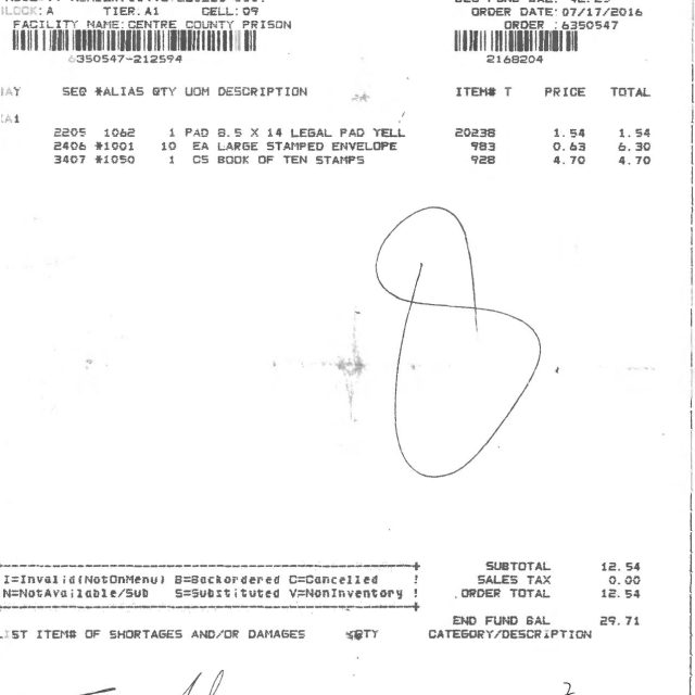 A printed order receipt from Keefe Commissary Network Sales showing items ordered for Centre County Prison, including legal pads and envelopes, with a handwritten signature and dat